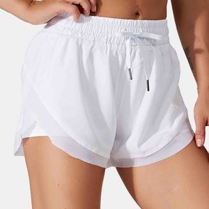 Halara White high rise running shorts - size M